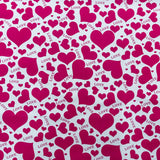 115CM PRINTED POLY COTTON PINK HEARTS WITH BACKGROUND