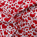 115CM PRINTED POLY COTTON RED HEART WHITE BACKGROUND